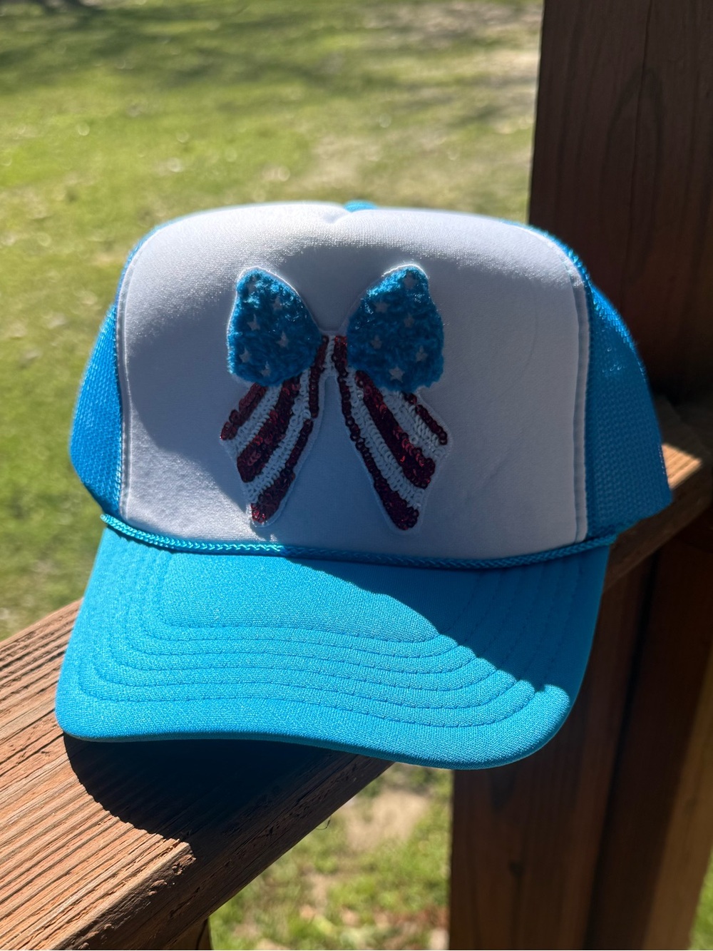 Blue and White Trucker Hat with Patriotic Bow Patch